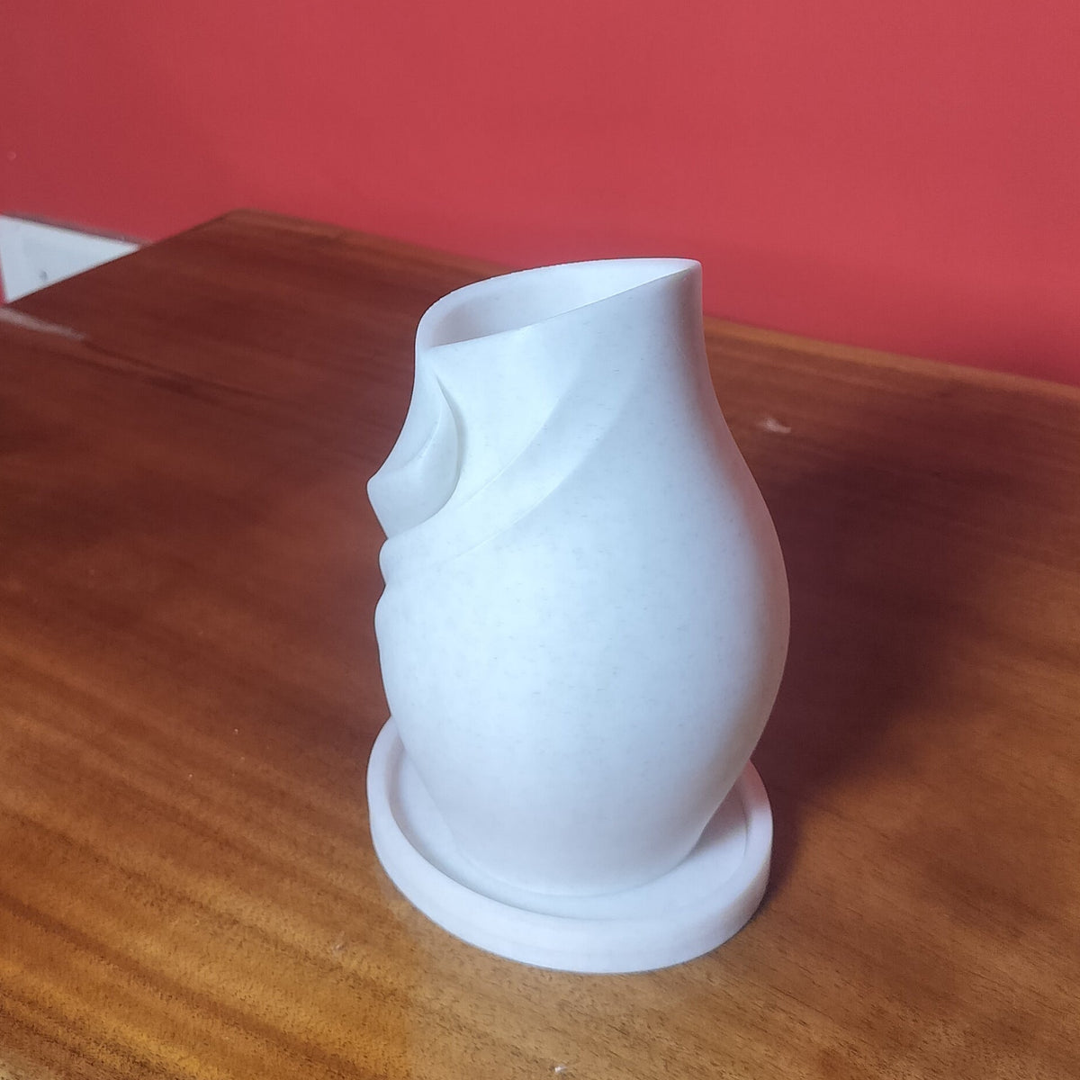 Stylish Curved Vase with Base
